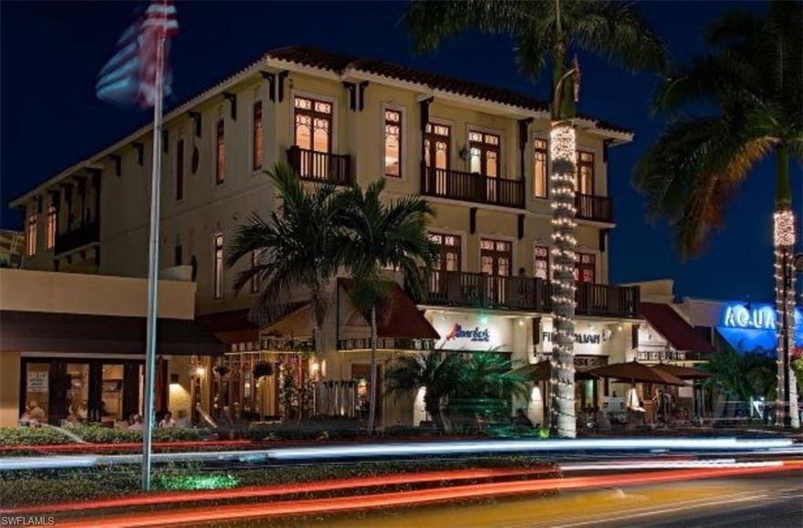 C.17333 - Live where the action is! Enjoy the best people-watching and most convenient location in the heart of Olde Naples from this spectacular Fifth Avenue South condominium! Unique property is one of just 3 units in the building and encompasses the entire 2nd floor w/a private two-car garage, secured elevator and a 48-foot wide great room with a balcony overlooking Fifth Avenue! 2 NEW HVAC units. Smart Home Automation. Over 4,000 sq. ft. of sheer luxury created by Stan Topol and Associates of Atlanta, this is truly the ultimate in high style living in downtown Naples! Kitchen and baths exquisitely appointed by Design Gallery of Atlanta. Sleek black slate tile and traditional black walnut flooring blend contemporary flair with timeless style and elegance. Floor to ceiling cabinetry, a large center island and top of the line Wolf appliances includes a six burner gas stove w/double ovens & will please the most discriminating chef. The sumptuous master suite offers a spacious bedroom with French doors out to a private balcony, his and her separate, spa-like master bathrooms, and two large walk-in closets. There are two additional guest bedrooms with en-suite bathrooms, and a study.