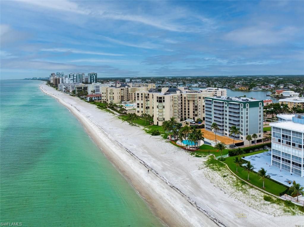 Photo of 3003 Gulf Shore BLVD N #404, NAPLES, FL 34103 (MLS # 225048941)