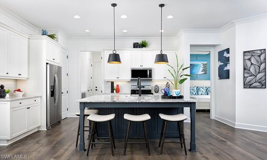 The Sanibel Coastal Cottage is now available in the pristine nature-influenced community of The Isles of Collier Preserve by Minto Communities. Surrounded by nature, embraced by luxury and just minutes from Downtown Naples and the beaches, this beautiful 1,924 sq. ft. Cottage Home has 2 Bedrooms, 2 Bathrooms, 2 car Garage. A $2,500 buyer incentive is available FOR A LIMITED TIME! The Isles of Collier Preserve captures the timeless architecture and traditions of Old Naples. Over half of the 2,400 acres are lakes, nature preserves and natural habitat. Elegant single-family, villa and coach homes overlook miles of scenic kayak and biking trails along the tranquil Cypress Waterway. Visit our interactive Discovery Sales Center and experience this one-of-a-kind community for yourself! The Isles Club has a Fitness Center, Resort-Style Pool, Tennis, Pickle Ball, Hiking & Biking Trails, Two Kayak Launches and 8 Miles of Kayak, Paddle Board, Catch & Release Fishing and the OVERLOOK BAR & GRILL! Photos are of model, not home being sold. ****UNDER CONSTRUCTION. Estimated completion Summer - Fall 2023.