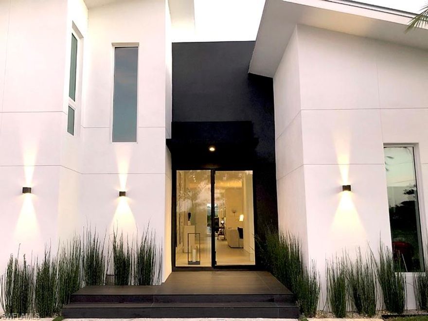 Outstanding opportunity to purchase this well maintained newer custom built designer home located in the highly sought after Lake Park neighborhood. This home does not disappoint, beautiful Contemporary Modern European influence will be admired upon entering the home. This southwest corner private three bedroom/ + media room residence encompasses an abundance of natural lighting, amazing north, south, east, and west views from the main living area.  Currently 3445 square feet under air with an oversized garage that will accommodate 2 cars and a golf cart. Collaborated in the fall of 2018 by Naples renowned Morton and Wasmer Builders and French Architect & Naples designer, Antoine Testard Designs.  The home features custom cabinetry throughout, seamless integration of the open concept kitchen that opens up to the courtyard, kitchen appliance to include Miele and Jenn-Air. The main floor consists of two master suites plus a versatile fourth bedroom//media/office and library to boast. The upper level completes its own private suite for quest to retreat. A beautiful home to entertain in a luxury living ambiance. This one of a kind timeless pool home is central  to downtown, 5th Ave, The Four Seasons , Baker Park, the Gulfshore Playhouse, shopping and dining. Live the best life beautiful Naples has to offer.