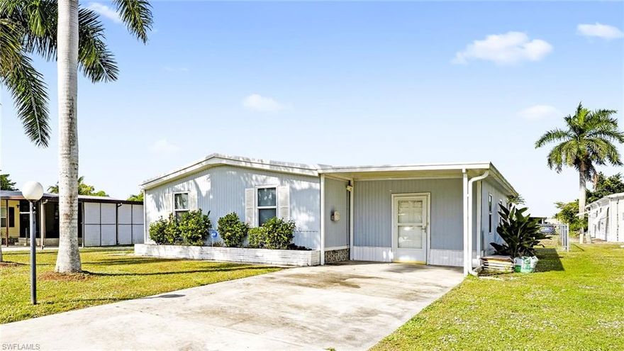 Cute home with lots of updates: newer AC, windows, and rubber roof with warranty..  Rare THREE bedroom home with two living areas and lots of storage. Home has a large fenced back yard!  All this awaits you in the fun and fabulous 55+ community of West Wind Estates just 12 miles from downtown Naples OR Marco Island with either offering beaches and many shopping and dining options. The community has many activities to keep you busy and a huge clubhouse and heated pool.  Bring your furry friends with you to enjoy this pet friendly neighborhood. There is ample space for your boat, RV, or other toys in the dedicated storage lot. The community fees are exceptionally low and you own your lot, NO lot rent. This home would also make an exceptional rental property. Your perfect Florida retreat or wise investment awaits!