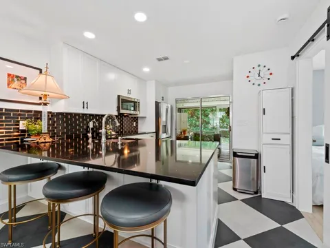 731 W Elkcam Cir Unit B101, Marco Island, FL 34145 - #: 225039555