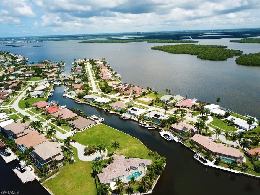 Outstanding opportunity to purchase an over-sized key lot with 180 feet of waterfrontage that is accompanied by quick water direct boating access to the Gulf of Mexico. Spectacular wide water views will complement the home you choose to build in paradise!