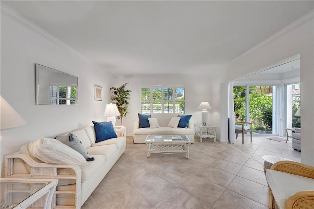 Photo of 1930 Gulf Shore BLVD N #D101, NAPLES, FL 34102 (MLS # 225069790)