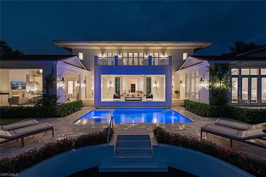 Truly an exceptional new construction home offering wide water westerly exposed sunset views within Aqualane Shores.  This VIV home is now without question the next best luxury waterfront opportunity in Naples and presents a combination of quality, location, and value without rival.  Residence includes 5 en-suite bedrooms plus a study, open great room floor plan with first floor master, 4 car garage, and is situated just a short stroll to 3rd Street amenities and Naples finest beaches.  Some of the interior features of this clean lined and coastally inspired home include full concrete construction, rich walnut wood flooring, fully integrated Savant home automation with Sonos, and an extraordinary gourmet kitchen complete with butler’s pantry.  The waterfront outdoor living area offers a complete and opulent outdoor kitchen secured by automated screens/shutters, fire place, heated pool/spa, and an 85 foot Ipe dock.