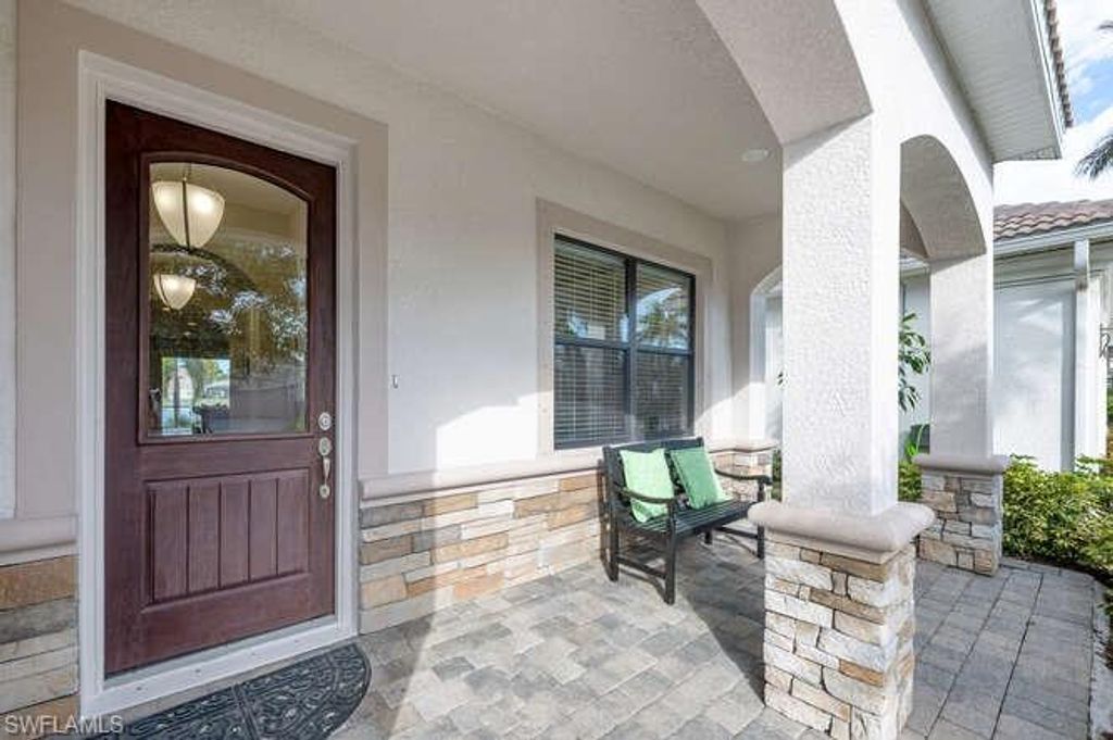 Photo of 1641 Serrano CIR, NAPLES, FL 34105 (MLS # 225080952)