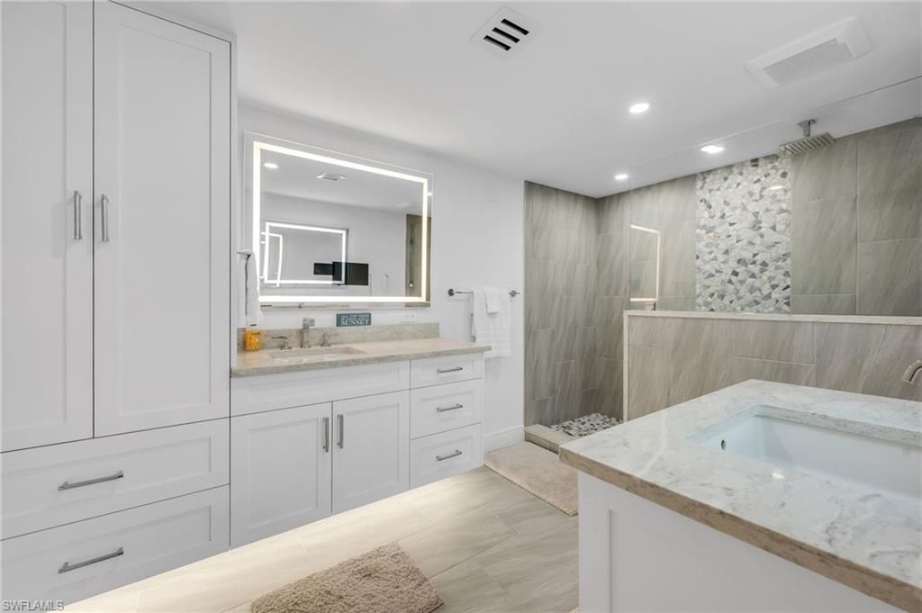 Photo of 6075 Pelican Bay BLVD #303, NAPLES, FL 34108 (MLS # 226002381)