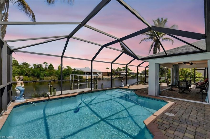Step into a waterfront retreat where every detail has already been thoughtfully elevated-- this canal-front home is truly move-in ready and designed for effortless Florida living. From the moment you arrive, you’ll feel the care and quality poured into every newer upgrade: ROOF (2023) HVAC (2022) POOL HEATER (2025) POOL PUMP (2023) SALT CELL (2025) WATER HEATER (2025) INSULATED GARAGE CEILING R-30 (2025) EPOXY GARAGE FLOOR (2025) FRONT ENTRY DOOR FULL GLASS IMPACT (2025) PAINT INSIDE AND OUTSIDE (2023) and many more too much to list.Enjoy your private dock with an 8,000 lb boat lift, making it easy to spend your days on the water, and unwind in your saltwater heated pool within a screened encloser perfect for year-round relaxation. The lanai offers added comfort and flexibility with locking according hurricane sliders, enjoy the Sunsetter motorized awning, creates the ideal setting for sunset evenings. Peace of mind comes with CAT- 5 Miami, approved hurricane impact windows throughout-enhancing safety, lowering energy costs, and even helping insurance premiums. Inside, the home shines with LG stainless steel appliances, beautifully upgaded granite counter tops in both the kitchen and baths, and a built-in bar that’s perfect for entertaining. Upgraded flooring in bedrooms (2019). Additional, 2 outside storage sheds, one with AC and electric, 8‘ x 14’. Homes like this don’t come along often- where luxury, functionality, and waterfront living align so seamlessly. Don’t wait and watch this opportunity slip away!!! Now is the time to make this exceptional home your own and start creating the lifestyle you’ve been dreaming of.