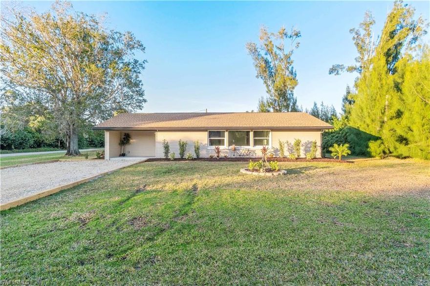 Beautifully remodeled home on a spacious corner lot, offering modern style and peace-of-mind improvements throughout. This property has been completely updated with designer touches, including a brand-new kitchen, upgraded flooring, fresh interior paint, all new plumbing, all new electrical, and a fully renovated laundry room complete with washer, dryer, and utility sink. Step inside to an inviting open layout featuring new tile floors and upgraded doors. The stunning kitchen boasts new cabinetry, a stylish tile backsplash, and stainless steel appliances. Major systems have also been taken care of—enjoy the value and reliability of a new HVAC unit, new electric panel, and new water heater. For added safety and efficiency, the home is equipped with all-new impact-rated windows along with a new front and side door. Situated on a desirable corner lot with no HOA, this move-in-ready home offers flexibility, privacy, and room to grow. Perfect for full-time living, an investment property, or a relaxing seasonal retreat.