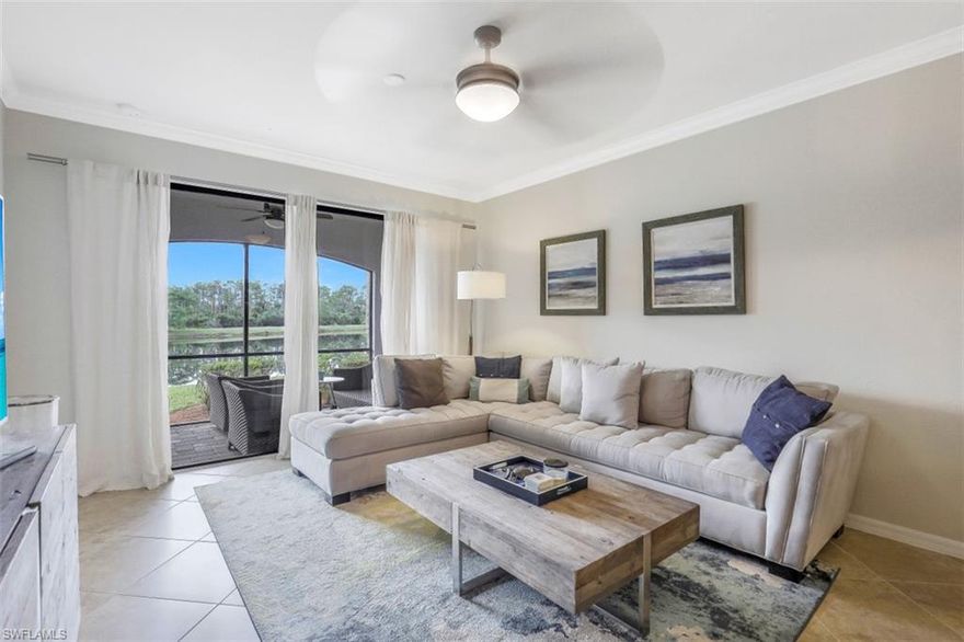 C4143 - Fabulous move-in ready 1st floor, 2 bedroom, 2 bathroom condo in Treviso Bay! This turnkey furnished Antonia floor plan includes the TPC Golf Membership.  This beautifully upgraded condo has crown molding, neutral decor w/tasteful furnishings, quartz countertops in the kitchen & baths, an eat-in kitchen, breakfast bar, pantry, wood cabinetry with tile backsplash, SS appliances, custom light fixtures, tile and carpet, impact doors & windows and a stunning SW exposure lake view. 

The master bedroom with en-suite bath overlooks the lake; the 2nd bedroom w/full bath ensure guest's comfort &  privacy. Enjoy the outdoor tranquility in the screened-in lanai. A covered parking space & storage unit conveys w/this unit.  Membership includes access to pools, fitness center, spa, full service salon, two onsite restaurants, bocce ball, pickleball, tennis courts, tennis pro shop, onsite fitness instructor and classes, biking/jogging trails plus the 18 hole Arthur Hills golf course and driving range.  Treviso Bay is an amenity-rich, resort style community close to downtown shopping, fine dining, boating and fabulous beaches.  INCOME PRODUCING - rented 1-1-22 thru 3-31-22, see remarks.