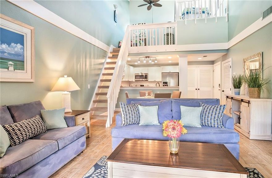 Beautifully furnished in coastal decor, this recently remodeled 2/2 PLUS LOFT is just 30 seconds from the sand! This top floor corner retreat overlooks the pool and feels like a large model unit with updated kitchen and baths. Vaulted ceilings, open floor plan, and numerous windows offer a light and spacious feel.  Gulf views can be enjoyed from the upper sleeping area from new windows that face the sea. This turn-key condo sleeps seven or more comfortably and includes stainless appliances, woodgrain tile throughout, new paint, new A/C and hot water heater in 2019, and UV-C air purifier installed this year. Superb income-producing vacation rental with $81K in revenue for 2021!! smaller, 40-unit Coquina Beach Condos offer lush plantings and paved paths to the heated pool, tennis court, beach boardwalk just seconds from your door & BBQ areas, and dedicated parking. Desirable East End location easily accessible to restaurants, shopping, and the causeway by foot, bike, or car.