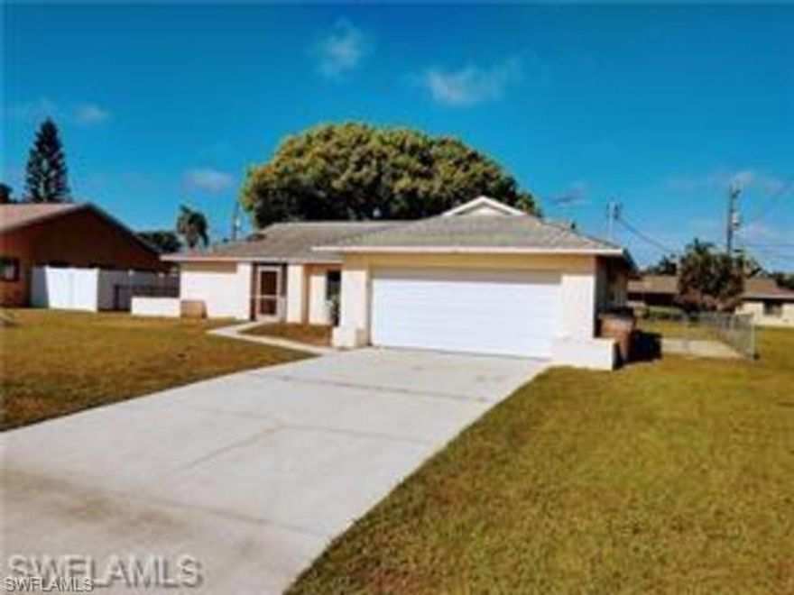 Do not delay. Amazing 3 bedroom, two bath , two car garage in this fabulous lactation .Open light and bright, large rooms fabulous open kitchen, large bedrooms smoke closets fantastic living dining combo with high ceilings large slider to lanai fenced yard all nestled into a fabulous area on cape coral close to shops and restaurants.  This home is a great candidate for a pool