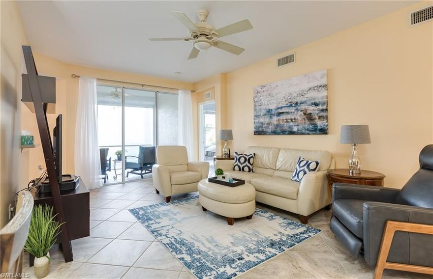 Beautiful 1st floor condo w/ two bedrooms, a den & a 1 car garage!! From the moment you enter.. Gorgeous updated tile flows seamlessly throughout the whole house and lanai for easy maintenance. Stunning updated master bath w/ granite, seamless shower doors & updated tiled shower. Nicely painted in soft tones that welcome the Florida sunshine and updated Stainless Steel Appliance Package!! Sit back on your relaxing lanai w/ nature surrounding views. You're sure to have peace of mind w/ updated accordion shutters on the windows & electric roll downs on the lanai!! Wait.. There's more.. This well decorated & furnished home is being offered turnkey!! Colonial Country Club offers a wide array of amenities including Tennis, Bocce Ball, Pickle Ball, multiple pools, a huge clubhouse w/ fine dining and casual sports pub, walking trails and an exercise facility with tons of classes to choose from along w/ low Social Membership fees and pay as you play golf. Conveniently located close to shopping, dining, entertainment and an International Airport. Resort Style living to it's finest, move in ready and ready for you to call it home!! *exterior photos similar (exterior currently being painted).