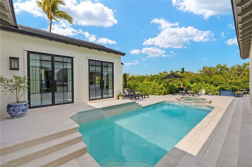 Step into a world of timeless elegance and refined luxury with this extraordinary custom residence by one of Florida’s premier luxury home builders. Designed by the legendary W.A. “Bud” Lawrence, this architectural masterpiece blends the rich influences of Spain, France, and Italy into a harmonious sanctuary of style and sophistication. Renovated to the studs in 2022 (prior to Hurricane Ian), this home has the perfect balance of modern luxury and old world character. 

Positioned in one of Fort Myers’ most coveted waterfront locations, this estate boasts serene, unobstructed views of tranquil mangroves and water—no neighboring homes facing the back, only privacy and natural beauty. With direct access to the Caloosahatchee River in mere minutes, this is a true boater’s dream, complete with two boat lifts, and a private dock. There is ample outdoor entertaining space that is centered around the sparkling pool and spa. 

Every detail of this home reflects impeccable craftsmanship and discerning taste. From the moment you enter, you’re greeted by luxurious designer finishes, top-of-the-line appliances, and custom selections that speak to a lifestyle of effortless elegance. The all-new, just-completed flat tile roof crowns the home with modern distinction, while upgraded all-impact doors and windows provide peace of mind and effortless beauty.

Importantly, the inside of this home has never experienced any flooding or stormwater intrusion—even through Hurricane Ian—underscoring the integrity of its construction and its exceptional elevation.

Inside, the ambiance is one of European charm fused with modern convenience. Tall ceilings, handcrafted detailing, and a flowing layout create a warm, welcoming environment that is as functional as it is beautiful. Three bedrooms, plus a den, sprawl throughout the main part of the house. An additional bedroom and bathroom are separate in an in-law suite format. This is perfect for visiting family, a live-in nanny, or older child that desires more privacy. Whether you're entertaining guests or enjoying a quiet evening overlooking the water, every space in this home has been thoughtfully designed to elevate your everyday living.

This is more than a home—it is a rare opportunity to own a European-inspired waterfront jewel, where no expense has been spared and every moment is touched by grace and grandeur.

Luxury, privacy, and effortless waterfront living—this is Fort Myers at its finest.