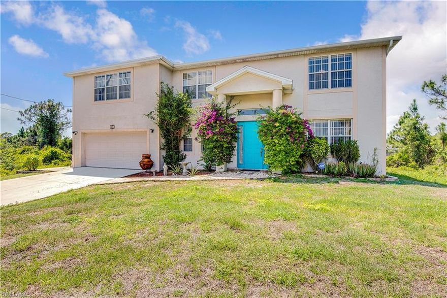 This is a potential Short Sale, subject to lender's approval. Room for the entire family with comfort! This 2-story home offers almost 2900sf of living space with all bedrooms upstairs and main living space downstairs. The home has a large backyard that has more than enough space for a pool if desired. Custom tile work is featured in the downstairs Half Bath, Kitchen and the Master Suite. Upstairs there is a spacious loft area, 3 Guest Rooms sharing a Guest Bath w/ tub&shower combo and a Master Suite. The Master Suite has room for a California King and a sitting area w/ the Master Bath having a soaking tub and shower, plus a door to a balcony. Two French door entryways to the Den/Home Office can be found from the Foyer & the Living Room. There are two eating areas, Formal and Eat-In w/ the Kitchen in the middle. The Kitchen features a unique design w/ custom brick/tile work, an island w/ Breakfast Bar & pot/pan rack. Located on a quiet road in Lehigh Acres w/ close proximity to lots of shopping, dining, and schools.