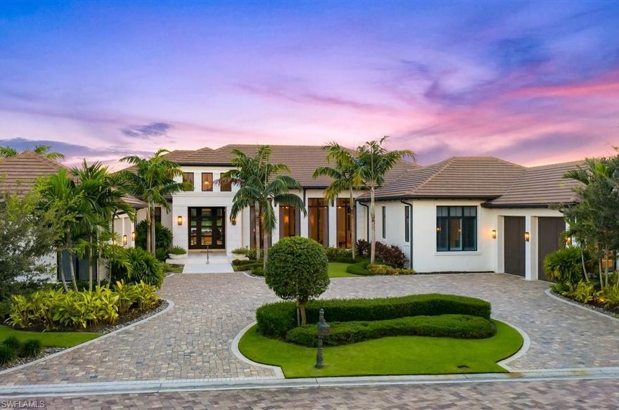 This custom-built Talis Park home features over 6,300 square feet with 4 ensuite bedrooms plus a den. Barely lived in and practically new, this home is located on an exclusive street within this luxury golf and tennis community in Naples. Through the foyer and parlor, a massive great room flows into a large dining area and stunning double-island gourmet kitchen featuring a quartz waterfall island. The outdoor living area includes a summer kitchen and bar, fire pit, pool and spa, waterfalls, fire bowls, and expansive entertaining space. This is a smart home with incredible security, sound, WIFI and universal remote controls in addition to storm readiness from the whole house generator to all impact glass and electronic shutters on the lanai. This one is a must see before it is gone!
