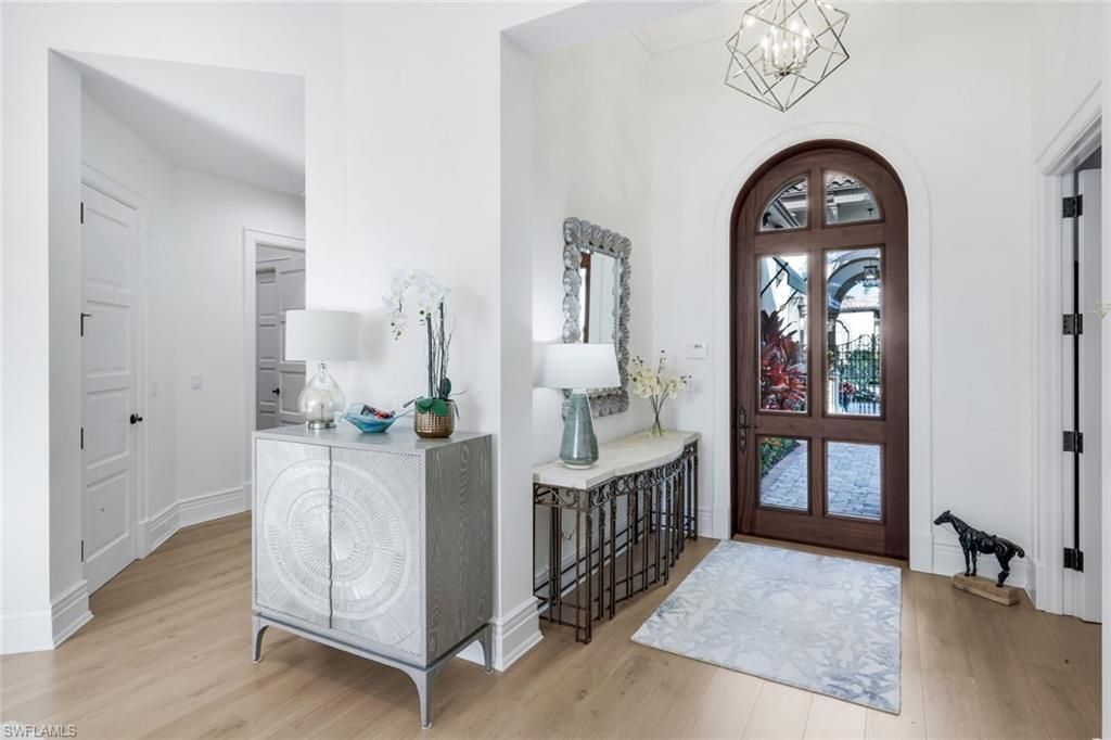 Photo of 1561 Marsh Wren LN, NAPLES, FL 34105 (MLS # 226007712)