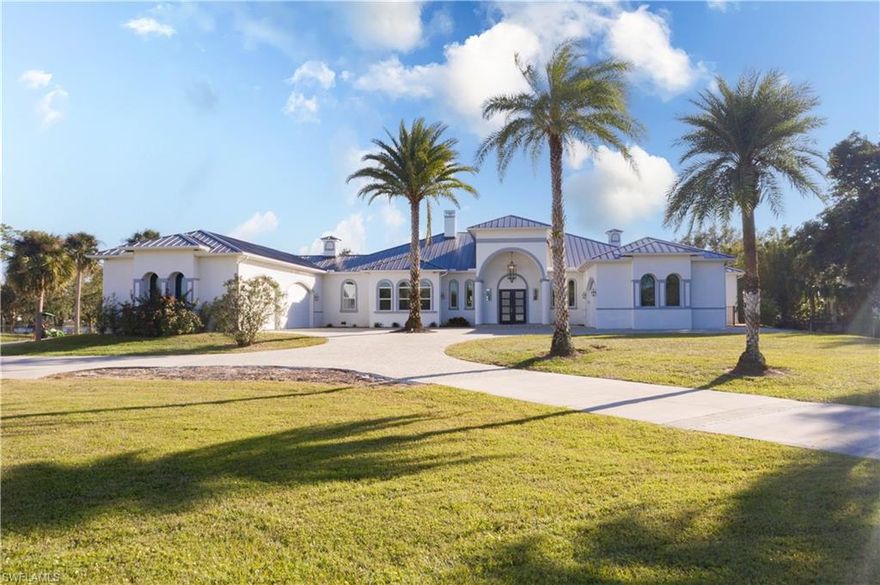UNPARALLELED RIVERFRONT LUXURY ON ALVA'S MOST COVETED STREET! Nestled along 2.5+ acres of breathtaking Caloosahatchee River frontage, this fully remodeled estate combines timeless elegance with cutting-edge modernity. Spanning over 5,300 sq. ft., this 3-bedroom, 3.5-bath + den/office sanctuary boasts a standing seam metal roof, all-new impact-resistant windows, a whole-house generator, and electric hurricane shutters for total peace of mind. Custom cabinetry, gleaming hardwood floors, and updated countertops define the open kitchen, complete with new Dacor appliances, a wine cooler, and separate 36 cu. ft. fridge and freezer.

Relax in the spa-like master bath featuring a standalone tub, walk-in shower, and designer finishes. Entertain effortlessly with a new Trex dock, dual boat lifts, and a resort-style pool. The freshly painted interior, plantation shutters, and modern lighting create an ambiance of refined luxury, while the epoxy-coated 7-car garage and automatic front gate ensure privacy and convenience.

This rare gem, framed by majestic oaks, offers direct Gulf access via the intra-coastal waterway, all just minutes away from the interstate. Discover serenity, style, and convenience—schedule your private tour today!