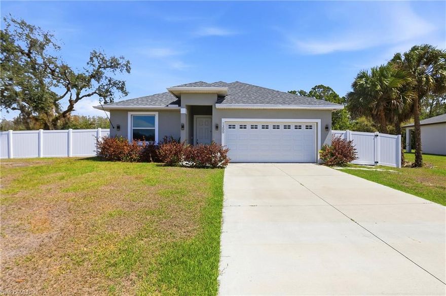 Welcome Home! This thoughtfully designed single-family residence in the heart of Lehigh Acres offers modern living with a touch of Southern charm. Boasting 4 spacious bedrooms, 2.5 bathrooms, and 2,063 square feet of building area, this home is perfect for families and entertaining. Enjoy the open-concept floor plan featuring a gourmet kitchen with quartz countertops, sleek stainless steel appliances, and kitchen island. The master suite includes a walk-in closet and an en-suite bathroom with dual vanities and a luxurious walk-in shower. Additional highlights include energy-efficient windows, a spacious two-car garage, and a private backyard ready for your personal touch and home automation. Located near schools, dining, and outdoor recreation, this property offers convenience and a tranquil lifestyle. Don't miss the opportunity to make this stunning new home yours! Schedule your private showing.