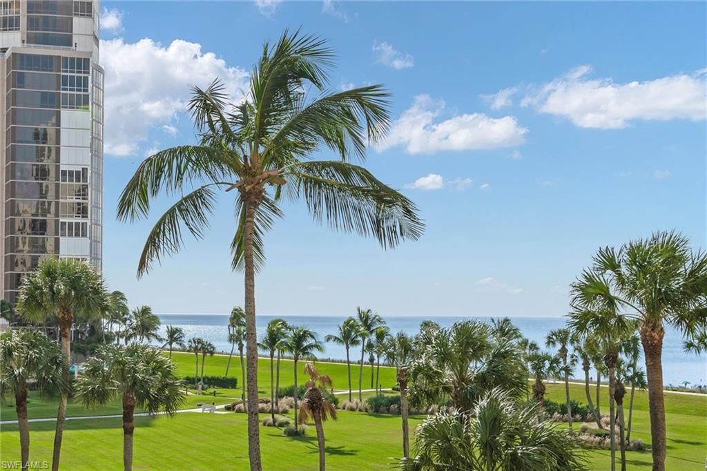 Photo of 4551 Gulf Shore BLVD N #405, NAPLES, FL 34103 (MLS # 225085003)