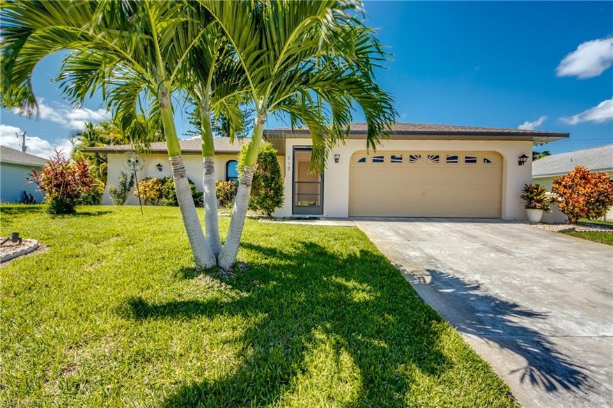 ** Move-In Ready Cape Coral Gem with Privacy & Upgrades! Welcome to your tropical retreat in Cape Coral! This charming home is move-in ready, with ALL assessments paid for peace of mind. Featuring a newer roof, brand-new A/C, new refrigerator, and hurricane impact windows throughout, this home offers worry-free living from day one. Enjoy total privacy with natural surroundings and a fully fenced yard, complete with lush landscaping and mature mango trees—your own private oasis! Relax on the screened-in front porch or unwind in the spacious screened lanai, perfect for entertaining or enjoying the Florida breeze year-round. Whether you’re a first-time buyer, snowbird, or investor, this home checks all the boxes with modern comfort, outdoor space, and unbeatable value. ** Don’t miss your chance to own a slice of paradise!