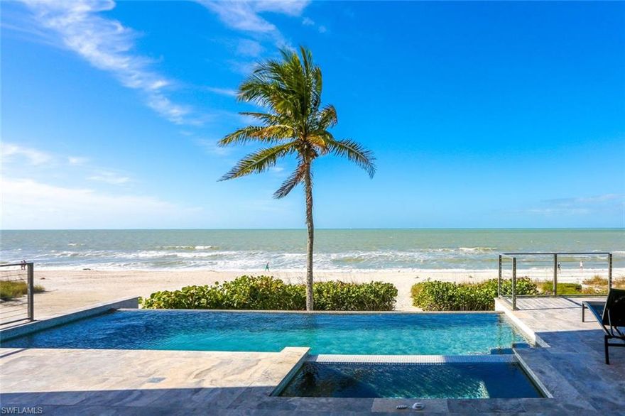 Direct Beachfront 2018 New Construction by the highly regarded Windover Development. Perfectly located minutes to Mercato & North Naples’ amenities, this state-of-the-art beachfront masterpiece boasts only the finest features, finishes & décor, with the Gulf of Mexico as the backdrop. Exceptional open floor plan with fully pocketing sliders to the beachfront entertainment deck with infinity edge pool & spa, outdoor kitchen with gas grill, fireplace & pool bath: seamless indoor/outdoor beachfront living. No details overlooked from the Gulf view chef’s kitchen with Thermador appliances, quartzite counters & adjacent walk-in bar, to the white oak hardwood floors & floating wood beam ceilings, to the Crestron smart home, lighting, and automation. Offered fully furnished & decorated in a stunning coastal contemporary motif by the celebrated Freestyle Interiors. This 5,300+ sq ft estate includes a 2nd master/VIP suite, garage for 4 cars & private elevator. Built to the most current & stringent codes with concrete block construction, Andersen hurricane impact windows, motorized screens + storm shutters & aluminum snap-clad metal roof system. Inside & out—a showcase of visionary design.