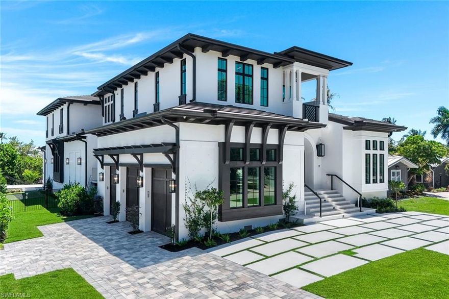 Crafted for those who expect nothing less than exceptional, this brand-new 2026 waterfront residence by Naples Home Builders is a rare offering in the heart of Naples. Perfectly positioned on an expansive corner parcel, the property boasts 80 feet of water frontage with direct, bridge-free access to Naples Bay and the shimmering Gulf of true haven for the avid boater. Designed for refined coastal living, the outdoor experience is nothing short of resort-caliber, featuring a sparkling pool and spa where tranquil mornings and golden-hour evenings unfold with ease. From your private backyard, set sail within moments and embrace the effortless elegance of life on the water.
Ideally located just moments from the charm and sophistication of 5th Avenue South, you’ll enjoy world-class dining, boutique shopping, and vibrant cultural experiences all within a short stroll. The sugar-sand beaches of Naples are less than three miles away, while Naples Executive Airport is a convenient six-minute drive—perfect for seamless arrivals and departures. A statement of lifestyle, where timeless coastal beauty meets modern luxury in one of Naples’ most coveted waterfront settings.