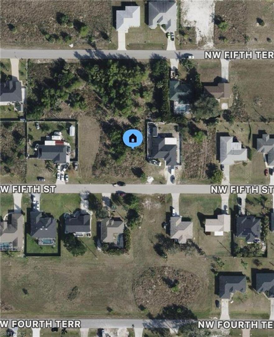 Seller also owns 325 NW 5th St (a corner lot). City water and sewer in place! Lowest priced lot in this area of Cape Coral. Easy access to Santa Barbara and Pine Island. Close to Sam’s Club. Paved road and electric at the curb! Send offer today! Hablo Español!
