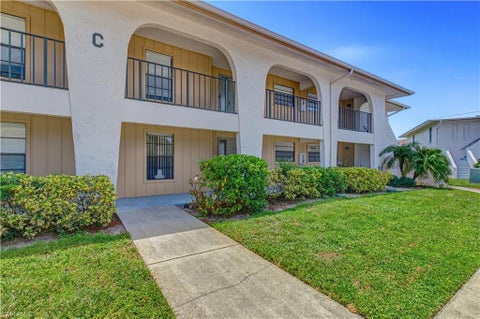 Photo of 151 Cypress WAY E #C103, NAPLES, FL 34110 (MLS # 226030807)