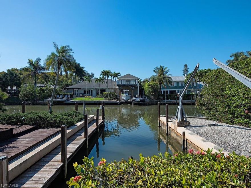 H.11848 Outstanding location in prestigious Aqualane Shores! Current residence has exceptional views and boat cut-in just minutes from Naples Bay. Perfect location for building your dream home! Walk to the beach and 3rd Street South!