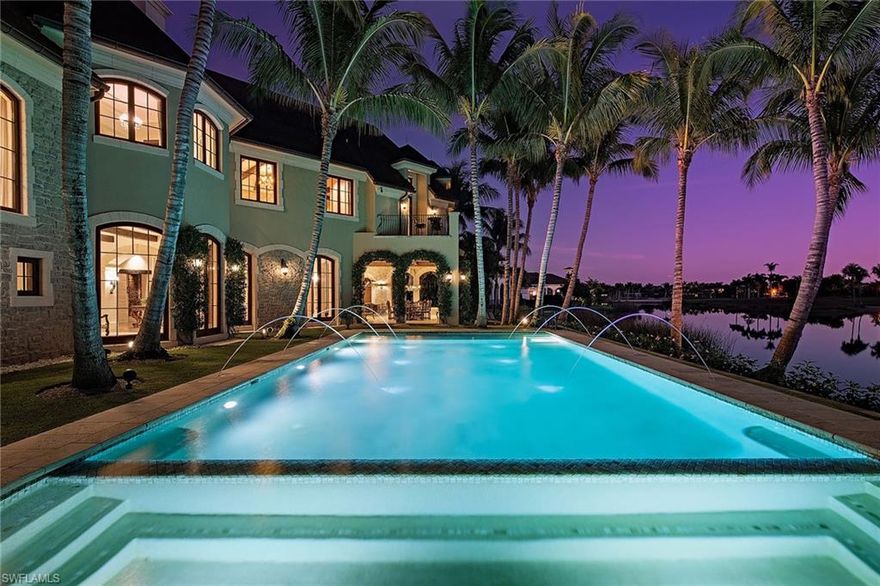 A dream home out of a storybook, this beautiful, custom-built French country estate was curated with utmost attention to quality and detail. Unique, handcrafted elements are complemented by a large and welcoming floor plan offering 8 bedrooms, 10 baths and abundant indoor/outdoor living and entertaining spaces. The main living rooms open to a spacious stone lanai with sunken bar, electric screens, stately pool and breathtaking lake views overlooking the Palm Course fifth hole. With built-in breakfast seating, a butler’s pantry and a wine galley leading to the dining room, the gourmet kitchen is fit for a chef. Elevator, 2 offices, home theater, billiards room, brick motor court and an attached 2-story gatehouse with guest rooms, living spaces and game room complete the home. Additional adornments include stone archways, authentic century-old barn boards, Turkish limestone, brick, hand-finished walnut, imported antique light fixtures, hardwood doors/trim and authentic European hardware. Meticulously maintained. Finished with cut-stone exterior, Ludowici clay tile roof and dual-pane hurricane-rated mahogany doors/windows, no expense was spared in creating this Grey Oaks masterpiece.