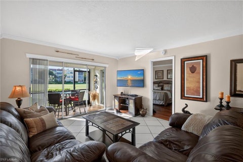 Photo of 201 Quail Forest BLVD #109, NAPLES, FL 34105 (MLS # 226037345)