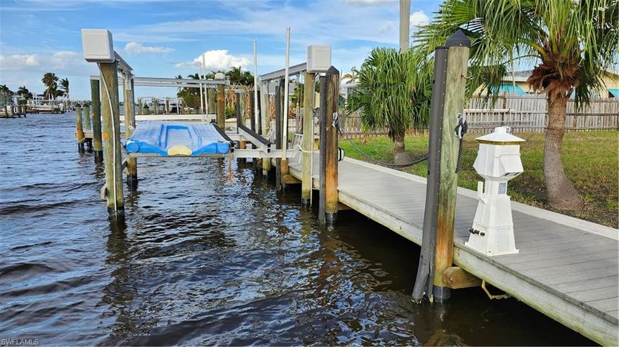 Prime Direct Gulf Access Lot in Matlacha – Sailboat Access with Private Dock & Lift
Discover the ultimate boater’s paradise with this rare cleared lot and dock with a lift for sale on the historic island of Matlacha. Offering true direct Gulf access with no bridges or locks to slow you down, this property is perfectly situated for those seeking a premium Southwest Florida waterfront lifestyle.
This vacant lot with gulf access comes build-ready, featuring a high-quality composite dock and a 7,000 lb boat lift.
Within waterfront properties, houses with a boat dock and lift are often the first to sell and for a higher asking price.
The property is located on a deep-water canal with an average 4-foot draft, making it an ideal sailboat access location for larger vessels. Shore power tower hook up on dock is a legacy feature, it provides a seamless starting point for a buyer to integrate a state-of-the-art marine power system. Sailboat access, sometimes called “direct” access, is one of the most desirable locations for boaters... because there are no height limitations, sailboat access canals are ideal for bigger boats.
Direct access, no bridges or locks between the island and the Gulf of Mexico. Ready to build, with city water and sewer available at the site. Existing well on the property for irrigation or external use. Come see this prime location! Experience the charm of Matlacha, one of Florida's top fishing communities and a hidden gem for coastal living near Cape Coral and Fort Myers.