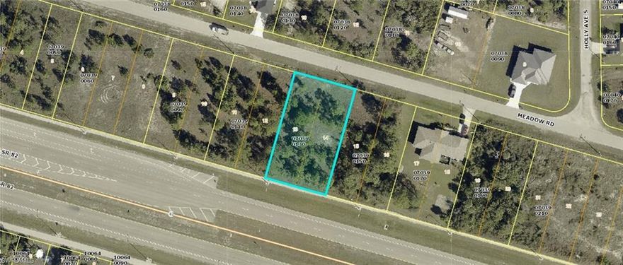 Prime Vacant Land Opportunity!!! No flood-zone worries. This residential lot sits right beside bustling SR-82, offering excellent visibility and high-traffic exposure that's ideal for future commercial rezoning possibilities. Currently zoned for a single-family home, the property also presents potential for rezoning to accommodate a duplex or even business uses, thanks to its strategic location along this major corridor connecting Lehigh Acres to Fort Myers and beyond. Bonus opportunity: This lot may be purchased together with the neighboring property at 3530 Meadow Rd for expanded space and greater flexibility. Enjoy the convenience of nearby shopping, dining, and entertainment along SR-82 and Homestead Road, with quick access to the Cape Coral Farmers Market, local eateries, and big-box stores. Top attractions like JetBlue Park (Red Sox spring training), Manatee Park, and the Caloosahatchee River are just minutes away, while Southwest Florida International Airport (RSW) is an easy 25 minute drive. Lee County is steadily growing eastward, with new development pushing toward Lehigh Acres along SR-82. It is expected for these trends to continue, it positions this property as a solid long-term investment. In one of Lehigh Acres' growing neighborhoods with no HOA restrictions, this lot offers a smart entry into a vibrant community — perfect for building your home or exploring investment options.