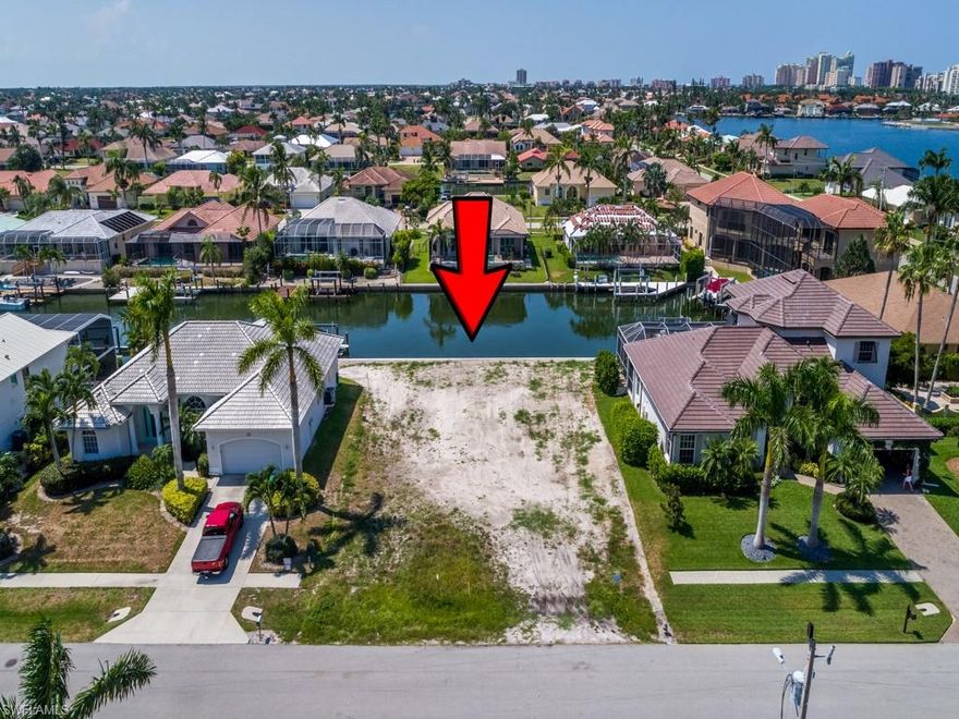 Fantastic value for this centrally located building lot in the very popular Lamplighter neighborhood. The property has a brand new seawall and is ready to build on! Very desirable southern exposure and in a neighborhood with many upscale homes on a quiet cul-de-sac that is close to the beach. The water indirect location provides a very quick out to the Gulf by boat!