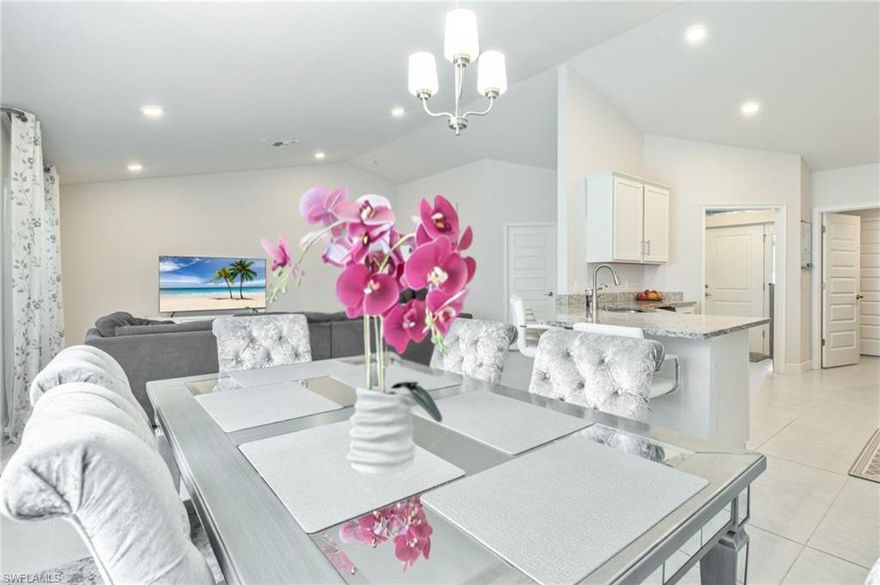 Step inside and be welcomed by vaulted ceilings and a spacious, open-concept floor plan designed with entertaining in mind. The heart of the home is a generous great room that flows seamlessly into the dining area and kitchen. Modern appliances, ample cabinetry, and a breakfast bar make this kitchen a true standout—perfect for hosting or everyday living.

The split-bedroom layout ensures privacy for the master suite, which features a walk-in closet and luxurious en-suite bath, offering a peaceful retreat at the end of the day. Two additional bedrooms and a versatile den/study provide space for guests, family, or a home office.

Enjoy Florida living year-round with a screened-in patio—ideal for outdoor dining, relaxing with a book, or hosting weekend BBQs. The backyard includes fruit trees, adding a touch of charm and sustainability.

Location Highlights:

    - Situated 25 minutes away from world famous Warm Mineral Springs.

    - Just minutes from shopping and dining.

    - 7 miles to Tampa Bay Rays Spring Training & close to Port Charlotte Beach Park.

    - Easy access to I-75 – quick drives to Sarasota, Naples, and beyond.

With quality construction, an inviting layout, and a location that truly has it all, this property stands out as a smart buy in today’s market.

Don't miss your chance to own this exceptional home—schedule your private showing today!