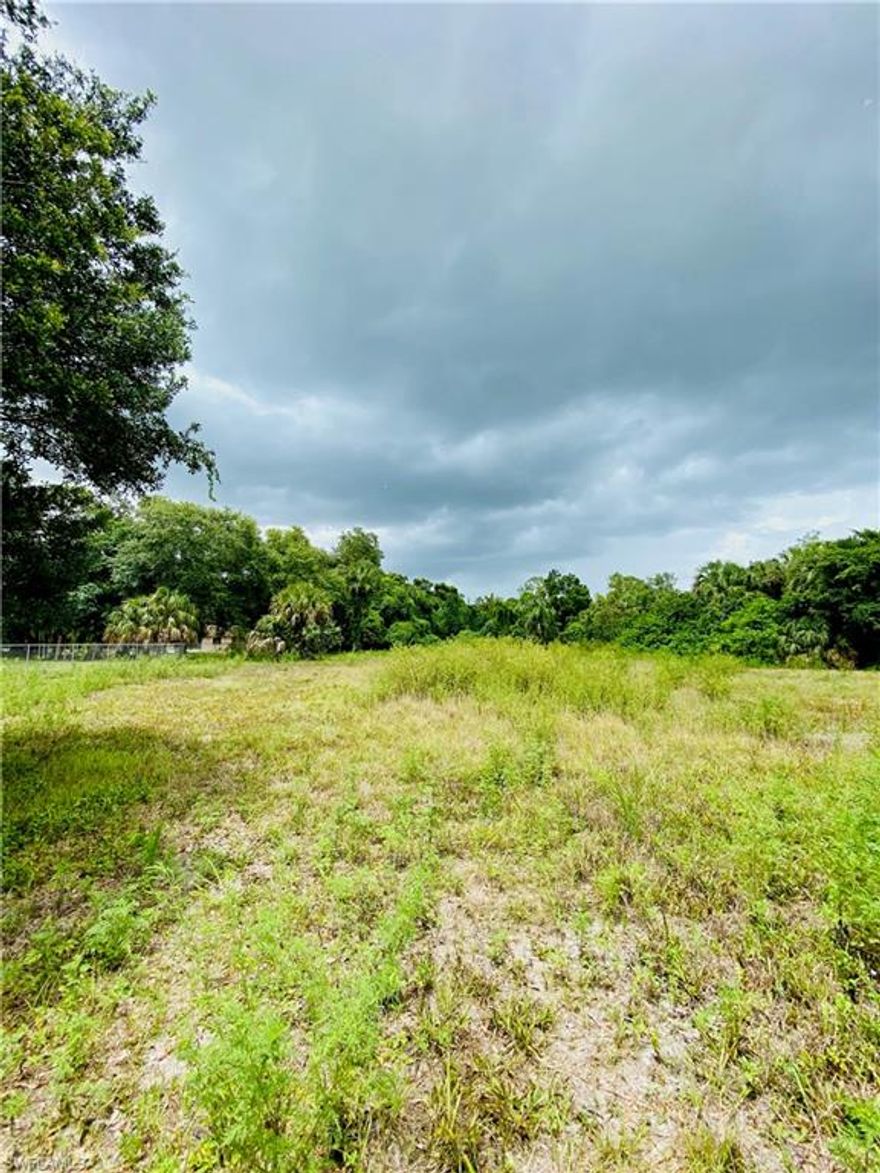 Great opportunity to build your dream home in a very desirable area. Between I-951 and Santa Barbara Blvd. Land is high and dry, partially cleared and partially fenced. There are two adjacent lots making a total of 2.64 acres. Less than 20 minutes to the beach.