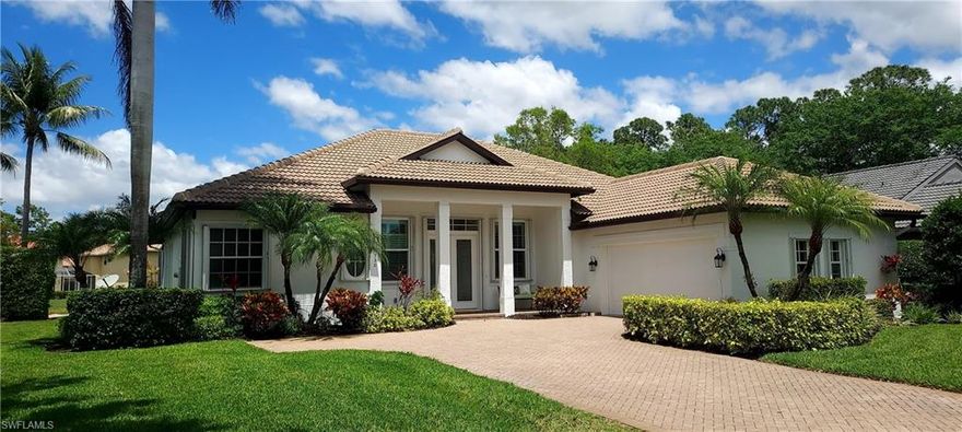 OPEN HOUSE SUNDAY 4/19/2026  1-4.  PRO PHOTOS COMING SOON  Outstanding value in Wilshire Lakes  Expansive home sits on a quarter acre lot with lake views.  The floorplan is open and flows seamlessly from foyer entry, living room, dining room, family room, master, and kitchen directly to large screened lanai and solar heated pool.  High volume and cathedral ceilings.  Plantation shutters and newer window bring in abundant light.  Kitchen features, neutral oak wood cabinetry, Granite Counters, Island & pantry.  Tile flooring throughout with luxury wood vinyl in bedrooms.  Newer tile roof (2018) A/C (2018) windows (2022). Wired surround sound, separate outdoor patio, private well for irrigation.  Shows easily and ready for your personal touches.  Great, secure, gated community off of Vanderbilt Beach Rd.  Close to shopping, dining, and the Gulf beaches.  Hurry and make your showing appointment today.