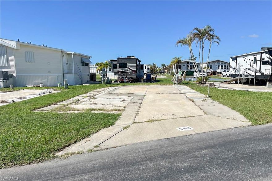 Great location! Enjoy the tropical lifestyle at Palmetto Palms RV 55+ Condo HOA where you own the land! This beautiful lot, with smoothed-out concrete pad has been updated with 50 AMP ELECTRIC service. Park your RV or place a new manufactured home on this 37x58’ lot! Enjoy other amenities like pickleball, shuffle board, volleyball, horseshoe pits, and a community walking path/bridge over the lake. Located on just a short stroll to the community pool, clubhouse and Tennis Courts. Palmetto Palms also offers boat storage and is biking or walking distance to Bunche Beach. Water, Sewer, Cable and Electric available in the community. Conveniently located near Fort Myers, and Sanibel beaches, shopping, and dining—this is the perfect place to call home or your seasonal retreat. one vehicle, no pets.