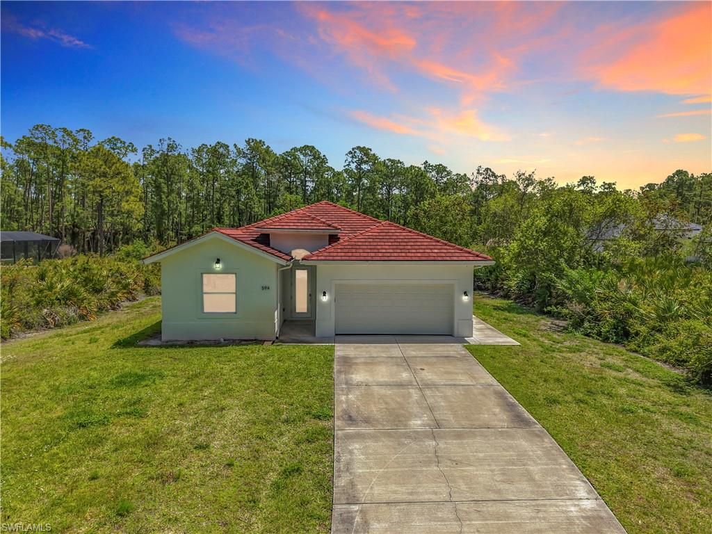 Photo of 594 31st ST NW, NAPLES, FL 34120 (MLS # 226015349)