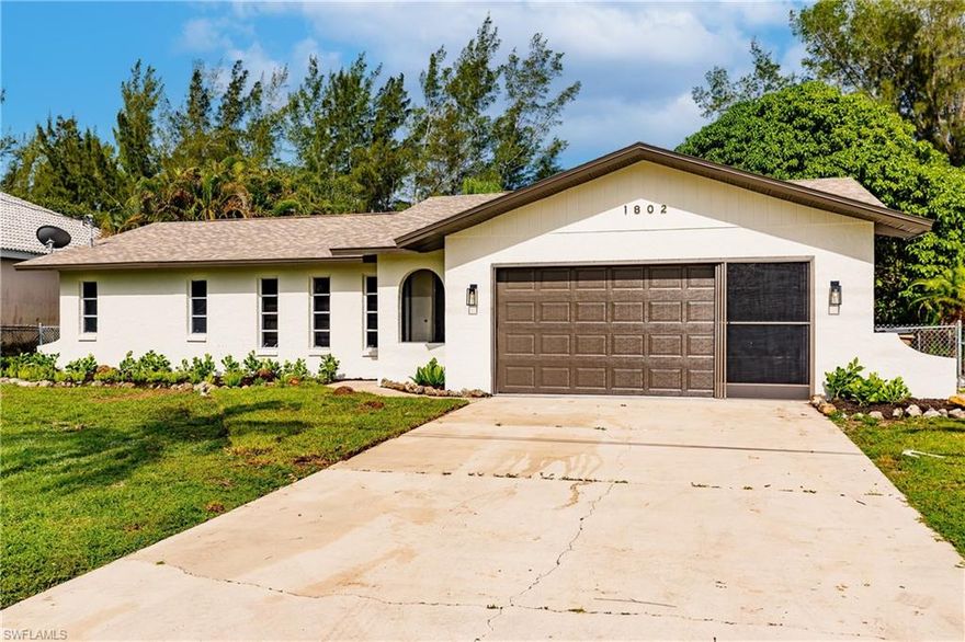 WOW!  Lowest priced waterfront pool home in all of Cape Coral! Look at this beautifully updated pool home in the desirable southwest corridor of Cape Coral!  This home has a split floor plan with new flooring throughout, new bathroom remodels, new kitchen with new appliances and new quartz countertops. New plumbing throughout. New pool remodel with new pavers. Newer roof makes insurance a breeze! Water front gives this home a very private feel. This would make an excellent first home or winter home!
