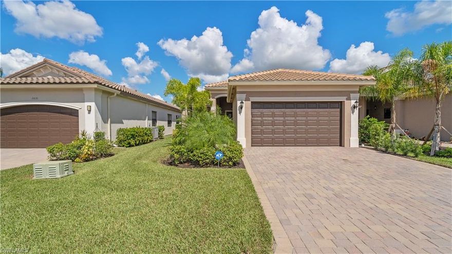 Welcome to Marina Bay! This beautiful residence lives very comfortably at nearly 2000 sqft featuring 2 bedrooms plus den/office 2bathrooms— Light, Bright and Open, the split floor plan offers privacy for everyone. The master suite with lake views includes 2 custom built out large walk-in closets and tray ceilings. Master bath features walk-in shower, dual sinks. Bright white kitchen offers gorgeous backsplash and quartz counters. Additional upgrades include: crown molding, IMPACT windows, security system, security cameras, custom closets throughout, epoxy finished garage floor, cabinets in laundry room, LED lighting, large custom wall shelving and cabinets built out in the den. The list goes on and the features are endless on this residence. Schedule your tour today to appreciate all that it has to offer.