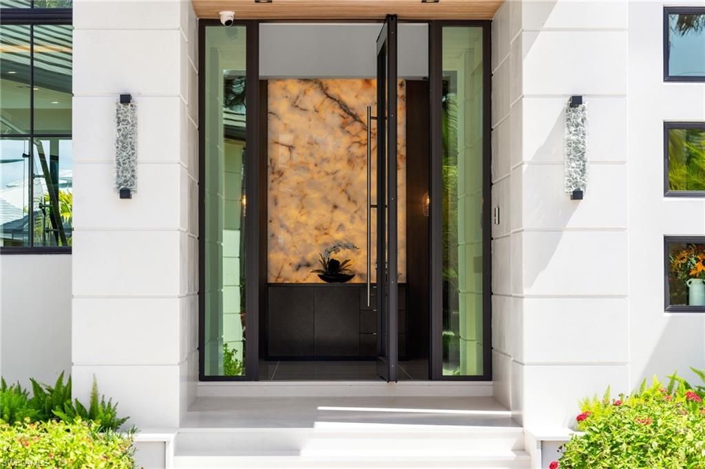 Photo of 2345 Tarpon RD, NAPLES, FL 34102 (MLS # 226011848)