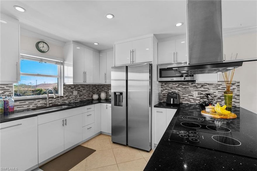 MOVE-IN READY – SECOND-FLOOR PRIVACY – BEAUTIFULLY UPDATED! This inviting 2-bedroom, 2-bath residence combines comfort, convenience, and modern updates for effortless Florida living. Renovated between 2020 and 2021, the home features bright and welcoming living spaces ideal for relaxing or entertaining. The well-appointed kitchen includes modern appliances such as a dishwasher, microwave, and disposal, along with a refrigerator that is just one year old. The garbage disposal was replaced in 2025, adding to the home’s thoughtful maintenance. A new ceiling fan on the patio enhances the outdoor living space, creating the perfect spot to unwind. Offered turnkey, this property provides a truly seamless transition—simply bring your personal items and settle in. The building’s roof was replaced in 2018 for added peace of mind. HOA dues include water, sewer, lawn care, insurance, and pool maintenance, making ownership both convenient and low maintenance. Residents enjoy access to a community pool and a location that offers quick connections to both Cape Coral and Fort Myers. Just minutes from shopping, dining, Cape Harbour, and Tarpon Point, this residence is ideal as a winter getaway or a comfortable year-round home. THIS PROPERTY QUALIFIES FOR A 1% LENDER INCENTIVE IF USING PREFERRED LENDER, INQUIRE FOR MORE DETAILS**