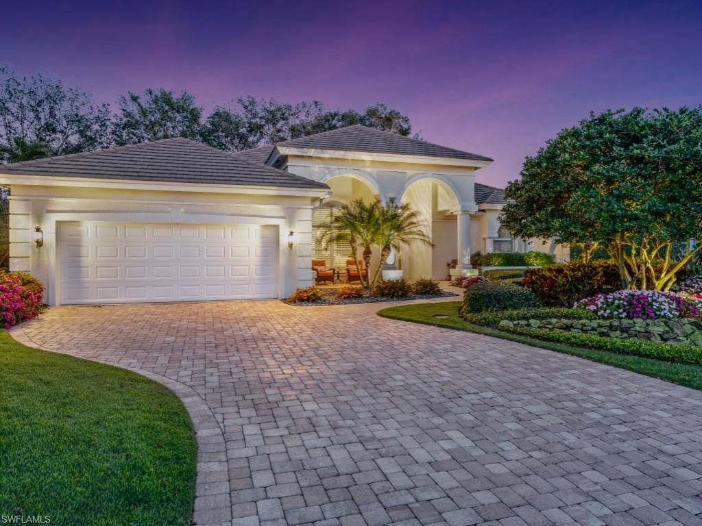 Photo of 762 Lynnmore LN E, NAPLES, FL 34108 (MLS # 225074589)