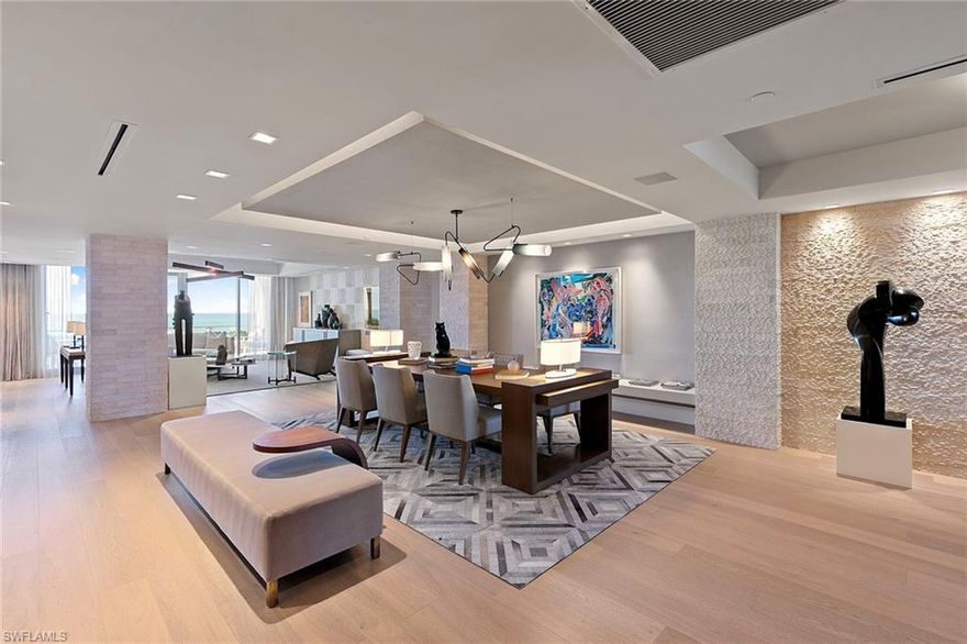 Mystique stands as the newest crown jewel among Pelican Bay’s high-rise residences, poised to capture the serene beauty of the Gulf. Beautifully positioned on the ninth floor, savor endless views of turquoise waters and brilliant sunsets that paint the sky each evening. Expertly imagined by Marc-Michaels Interior Design, this residence showcases a sophisticated blend of contemporary elegance and timeless detail. The open concept living spaces feature custom limestone columns, rich wood accents, Onyx fireplace and exquisite Russian Oak floors, a pristine white kitchen with Carrara marble countertops, Wolf and Sub-Zero appliances. Every element, from the custom millwork to the curated finishes and smart home features, reflects a commitment to refined luxury. Enjoy the indulgence of 24-hour concierge service and the effortless sophistication of life at Mystique. As part of the exclusive Pelican Bay community, residents enjoy private beach access with beachfront dining, fitness and wellness center, pickleball and tennis facilities, scenic walking and biking paths, and a vibrant beach club lifestyle. Just moments from Artis–Naples and the designer boutiques of Waterside Shops, this exceptional residence offers a rare opportunity to experience Naples prestigious coastal living.