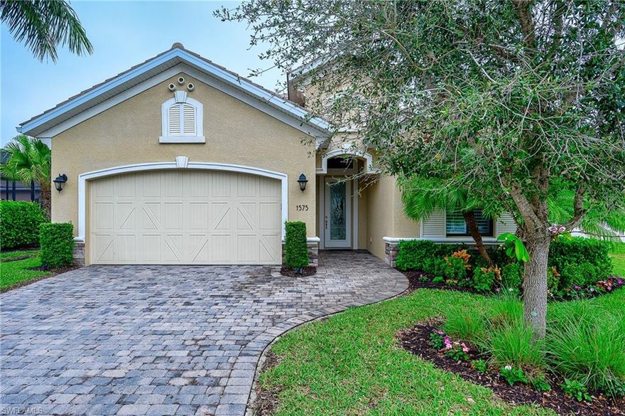 Better than new with all the bells and whistles, this 2016 gem is one of the newest homes built in Andalucia.  This meticulously maintained property sits on one of the largest lots in the ever quiet and beautiful Andalucia community and is being offered “Turnkey”.  Enter through the Custom front door with hurricane-resistant art glass to a beautiful entry.  There is tile throughout the main living areas AND all carpet in the Master Bedroom and both guest bedrooms has been removed and replaced with expensive European oak hardwood floors.  No worries with the internet here, as the property has the “Mesh Network” which strengthens and optimizes the Wi-Fi within the house.  A designer pendant has been added to the dining area, along with Granite, Premium Backsplash, and a new Bosch 5-series ultra-quiet dishwasher in the Kitchen.  Enjoy the oversized lanai with new entry door, new screening and tranquil Waterview.  There are ceiling fans throughout the home, including the lanai.  Andalucia is a gated private community with LOW HOA fees, a clubhouse, lap pool, jacuzzi and exercise room.  The renown Barron Collier Schools, I-75, beach and downtown Naples are just minutes away.