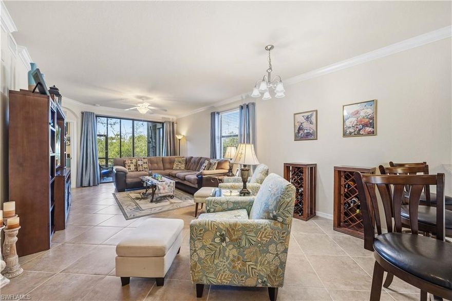 Welcome to this first-floor end-unit residence in Giaveno at Treviso Bay, offering a desirable 2-bedroom plus den, 2-bath layout with a DEEDED TPC GOLF MEMBERSHIP INCLUDED! As an end unit, the home benefits from added natural light and extra privacy, making it a comfortable and functional Naples retreat. The Sellers purchased the property from Lennar and the residence has been well cared for and remains in its original condition, providing an excellent opportunity for the next owner(s) to personalize or renovate at their own pace. For peace of mind, mechanical updates were completed in 2025, including new HVAC, new hot water heater, and the replacement of all plastic plumbing fittings with braided supply lines (as required by the Condo Association). The unit is being offered turnkey for buyer convenience; however, the furnishings are not intended to reflect added value. Sellers are happy to remove all furniture should a buyer prefer a clean slate. Additional features include an assigned covered carport space and access to Treviso Bay’s renowned amenities, highlighted by its TPC championship golf course, resort-style pool, clubhouse, dining, fitness center, and active social calendar. An ideal option for buyers seeking golf membership value, first-floor living, and a blank canvas in one of Naples’ premier bundled golf communities. Located just 5 miles from Downtown Naples/5th Avenue.