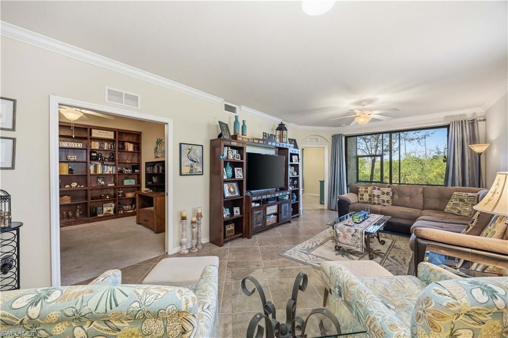 Photo of 9815 Giaveno CT #1218, NAPLES, FL 34113 (MLS # 226004345)