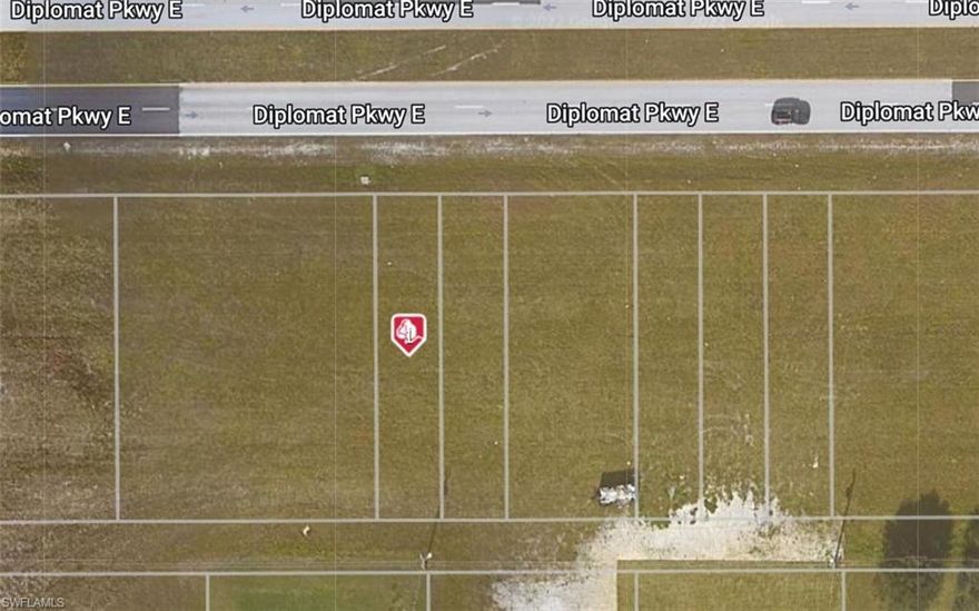 Cleared VACANT LOT (25x125) zoned Commercial Professional (CP), free of any animal restrictions. Conventionally located close to shopping and other local eateries, schools, gyms, storage and more.

This area is part of the NORTH 1 EAST 2027 City Utilities Expansion, starting in 2027 city water and sewer will be added to this entire area. Cape Coral is experiencing exponential growth and this area will be undergoing major construction in the coming years. (348 Diplomat Parkway W & 2008 Diplomat Parkway E & 1936 Diplomat Parkway E is also available, identical Lots)